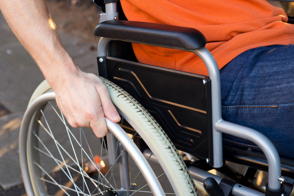 Person with disability in wheelchair