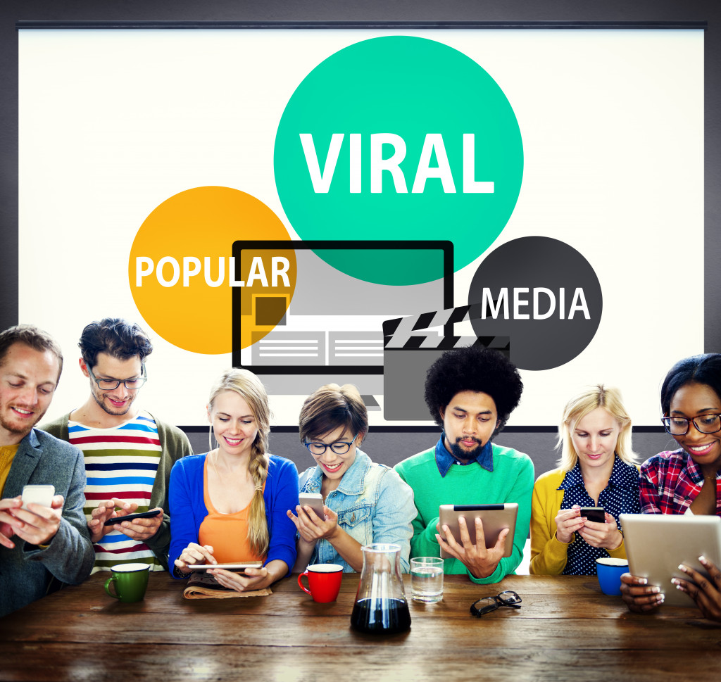 A diverse group of people viewing and sharing viral content