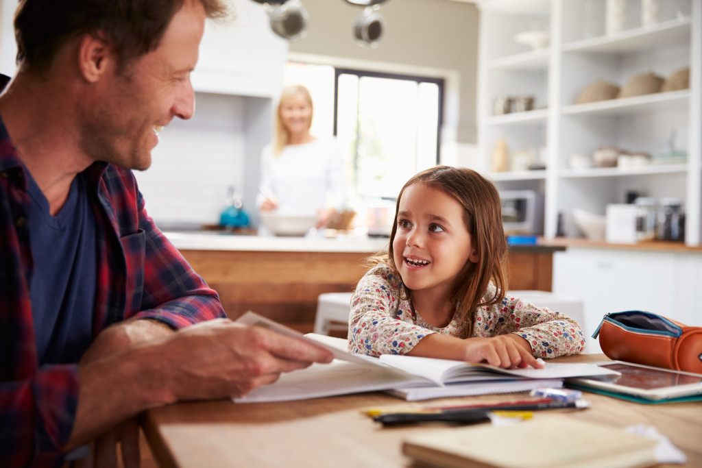 Parent helping child with dyslexia learn