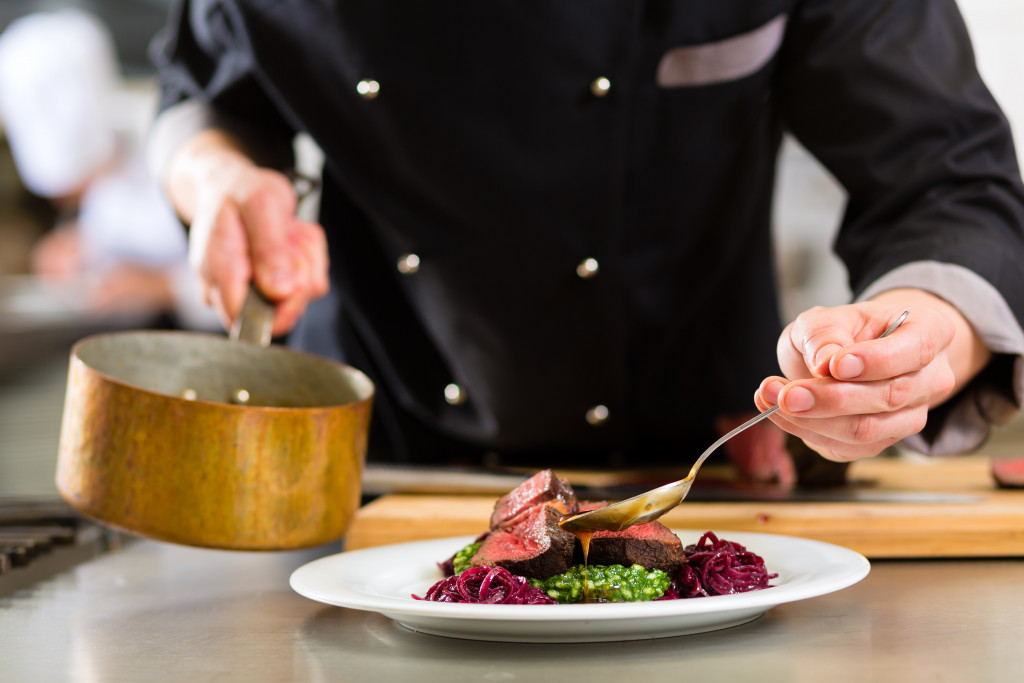 Kitchen and chef serving food