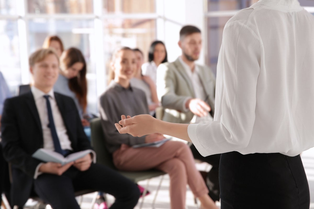 man presenting in seminar or workshop